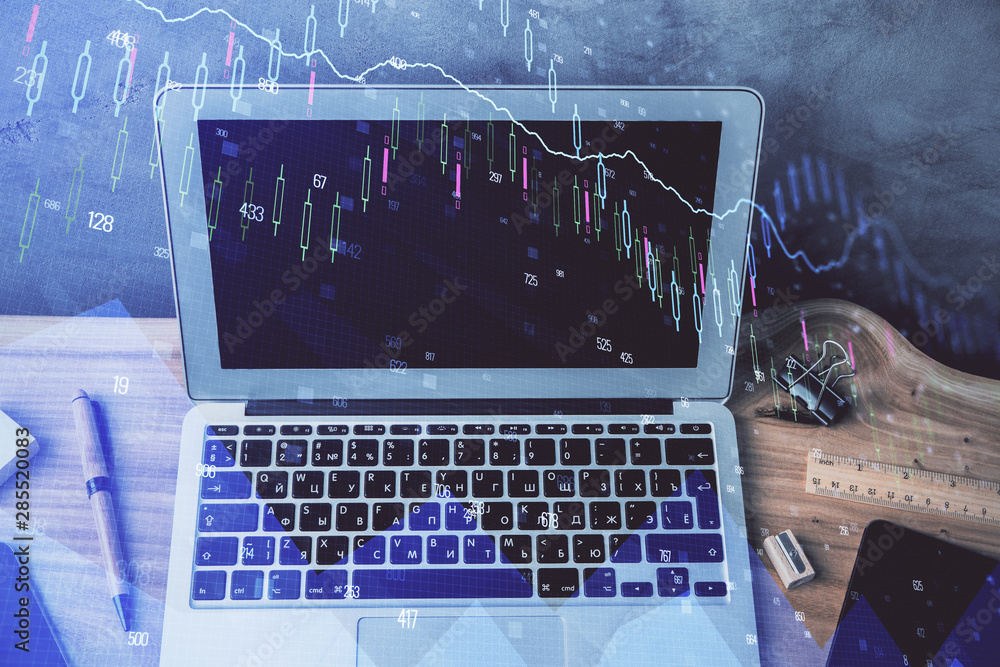 Double exposure of forex graph and work space with computer. Concept of international online trading. Double exposure of forex graph and work space with computer. Concept of international online trading.