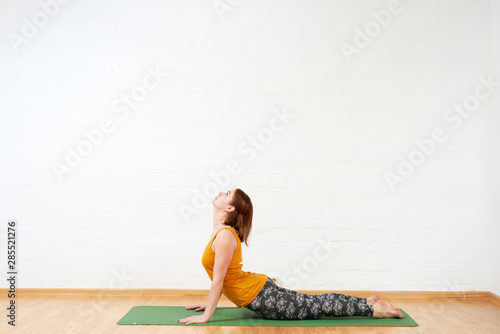 Female doing yoga asana for healthy back