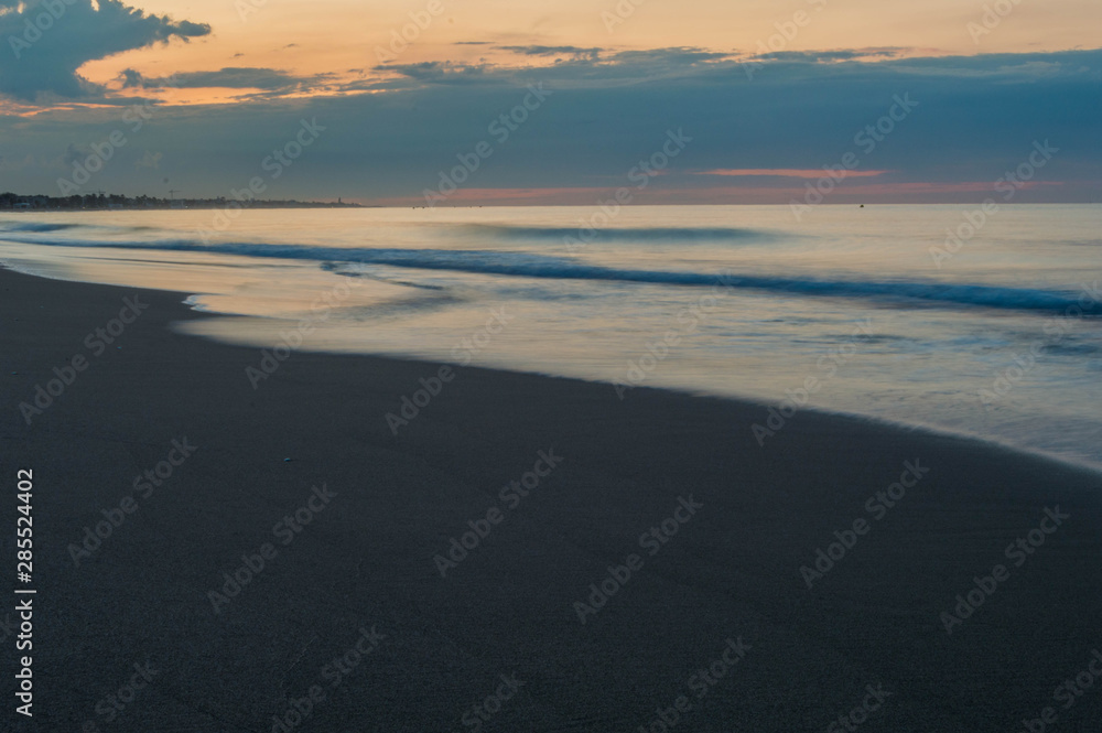 Landscape photo of the beach of Port Ginesta in Barcelona.