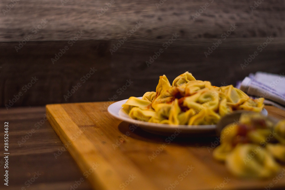 Plate of meat ravioli with tomato Plate of meat ravioli with tomato