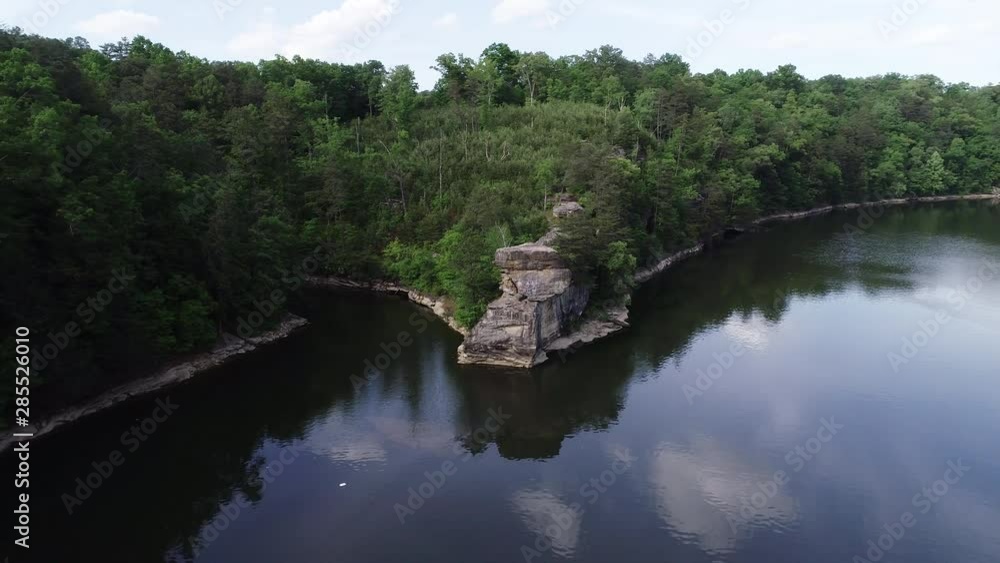 Pan left aerial, rocky cliff in Laurel River Lake Pan left aerial, rocky cliff in Laurel River Lake