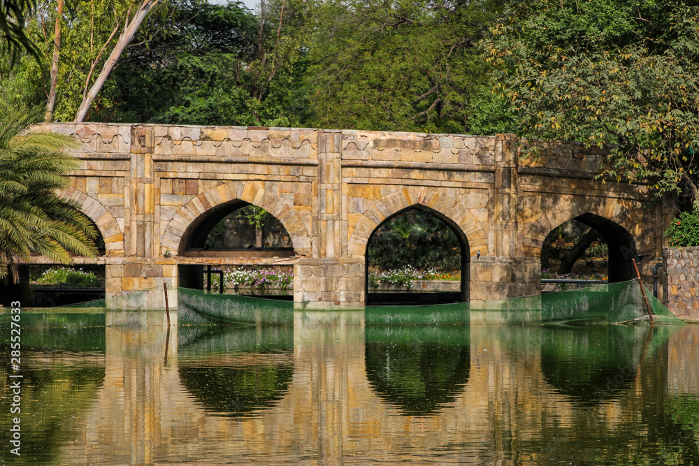 Old stone bridge in Lodhi Garden park, New-Delhi, India