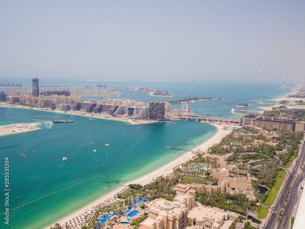 View on residential buildings on Palm Jumeirah island. The Palm Jumeirah is an artificial archipelago in Dubai emirate.