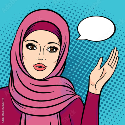 Arabic woman in hijab pointing on speech bubble for your message. Attractive muslim woman smiling face.
