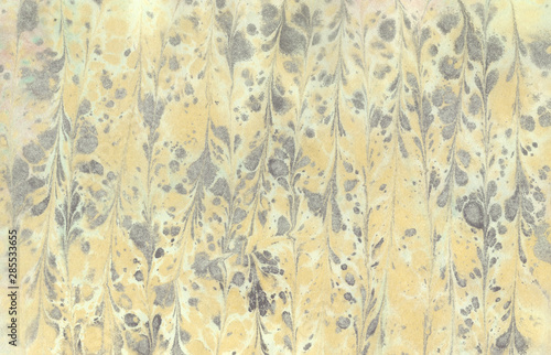 Marbled texture in yellow g...