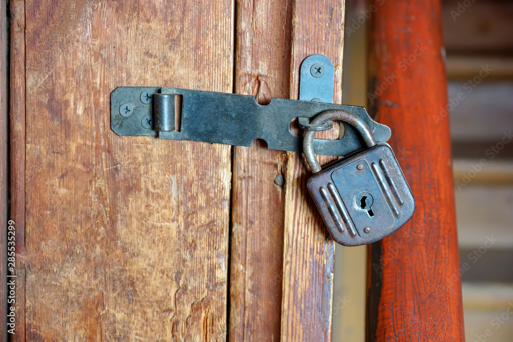 Old padlock on the pantry door., Stock Video
