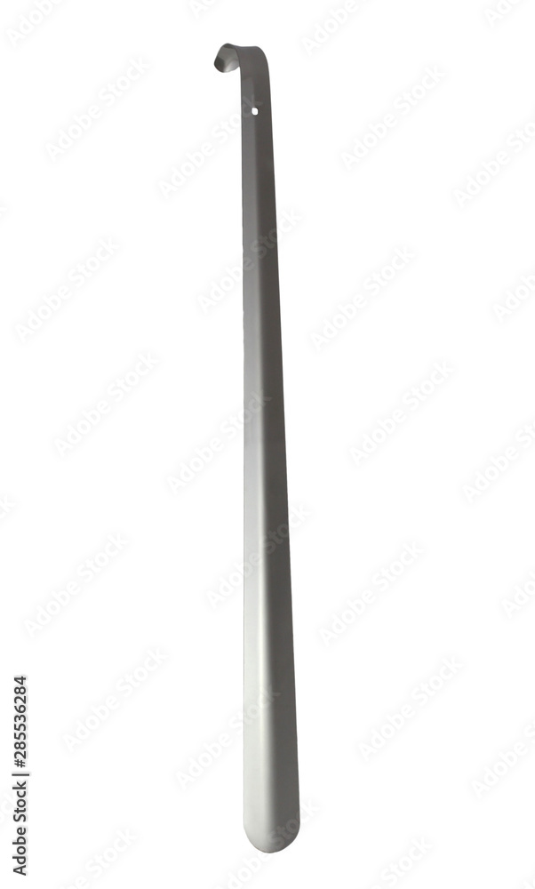 Shoehorn isolated on white background. It is long spoon. Shoehorn isolated on white background. It is long spoon.