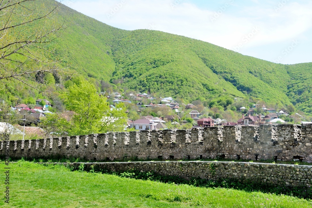 View over Sheki (Shaki) city and the Greater Caucasus mountains in Azerbaijan
