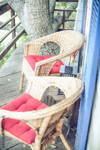 two chairs on porch