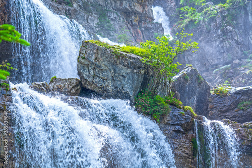 Waterfall in Italian Alps, Cascate di Mezzo Vallesinella, Trentino, Italy photo