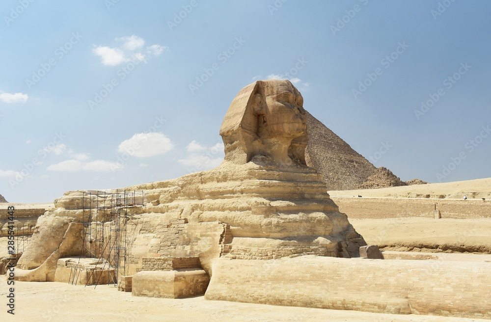 Naklejka premium The Great Sphinx of Giza, is a mythical creature with the head of a human and the body of a lion. Cairo, Egypt.