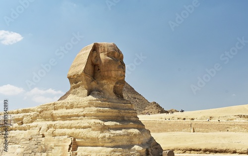 The head of the Great Sphinx of Giza, Cairo, Egypt. The Great Sphinx of Giza,  is a mythical creature with the head of a human and the body of a lion. photo