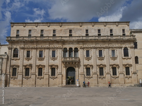Lecce – Bishop's palace. This monumental palace has a baroque facade surmounted by a clock and it is situated in Piazza Duomo of Lecce.