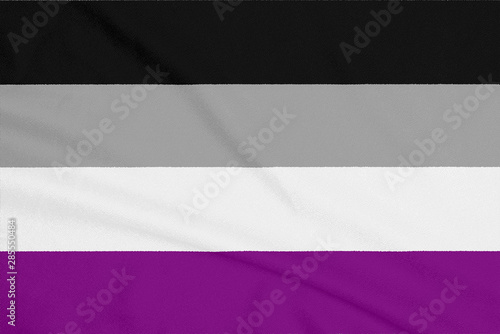 LGBT asexual community flag on a textured fabric. Pride symbol photo