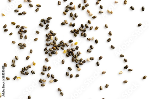Superfood chia seeds, top view, isolated on white background. Healthy breakfast, vitamin snack, diet and healthy eating concept.