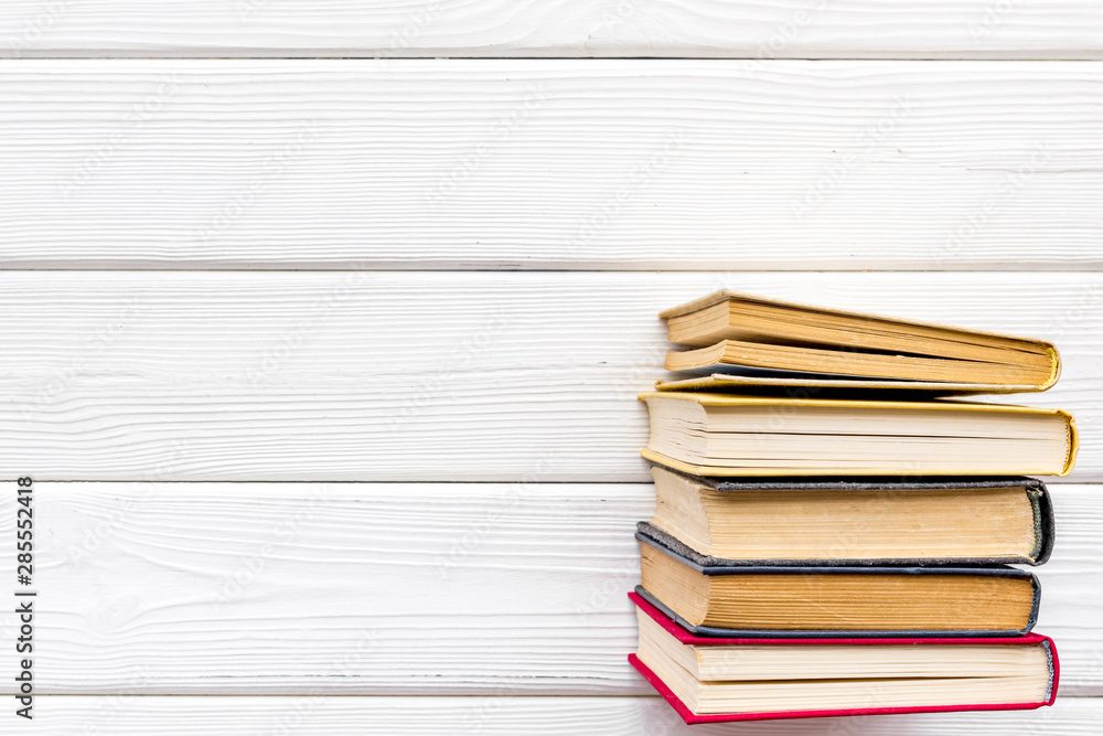 Books on library desk for reading and education on white wooden background top view mockup Books on library desk for reading and education on white wooden background top view mockup