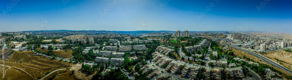 Aerial view of Jewish residential single family home neighborhoods on French Hill or Givaat Tzarfatit in Northern Jerusalem with Hadassah hospital