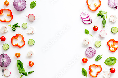Fototapeta Naklejka Na Ścianę i Meble -  Cook frame with fresh vegetables on white background top view space for text