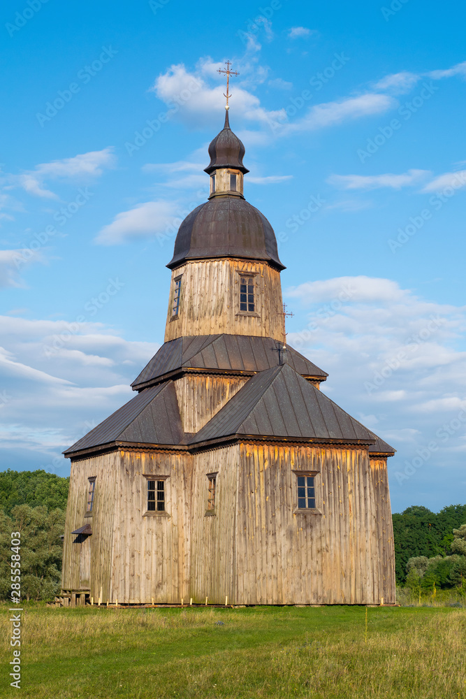 Fototapeta premium Old wooden Ukrainian church of the 16th century. The village of Ukrainian Cossacks.