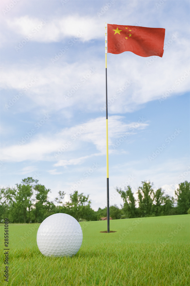 Obraz premium flag on golf course putting green with a ball near the hole