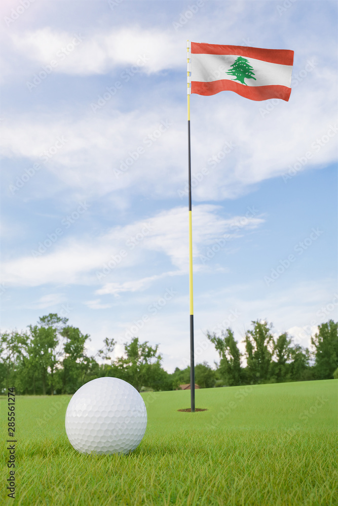 Obraz premium Lebanon flag on golf course putting green with a ball near the hole