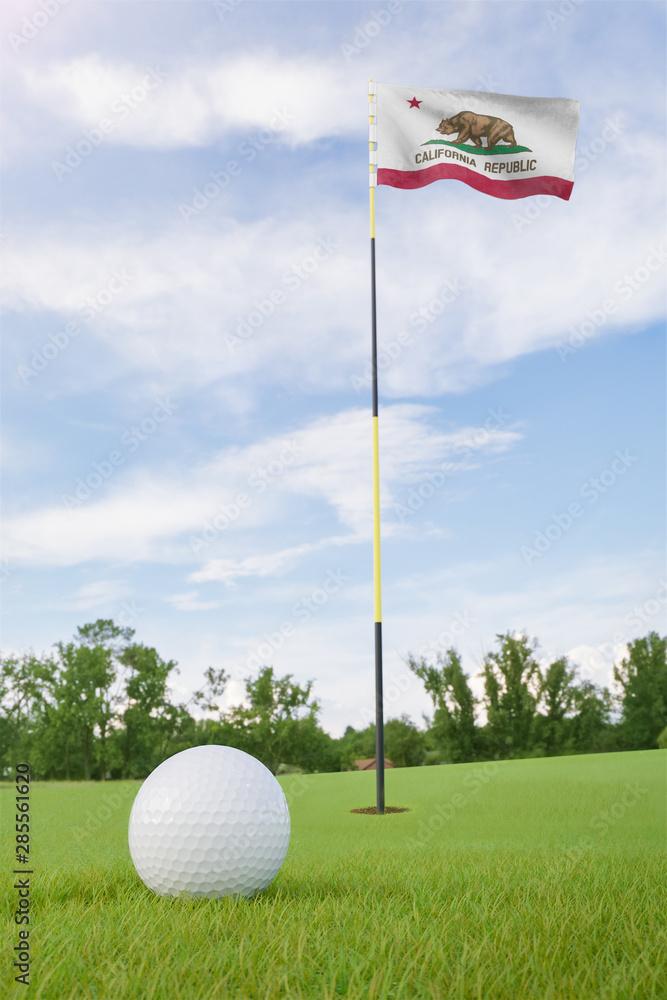 Obraz premium California flag on golf course putting green with a ball near the hole