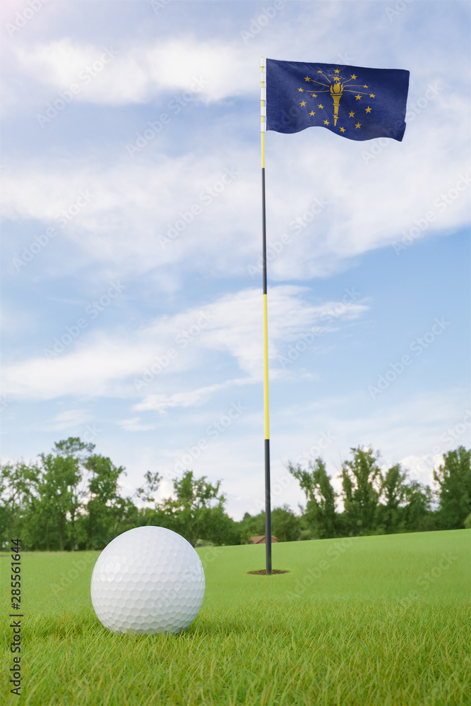 Obraz premium Indiana flag on golf course putting green with a ball near the hole