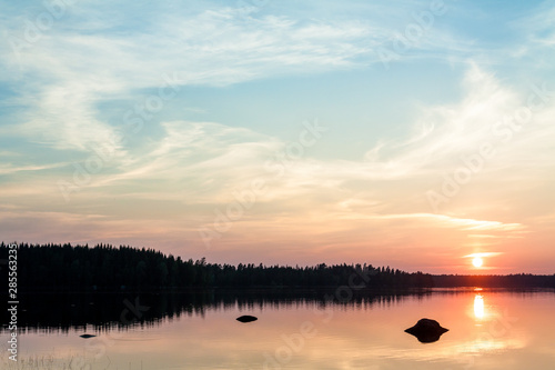Beautiful sunset over lake in the Leivonmaki National Park  Finland