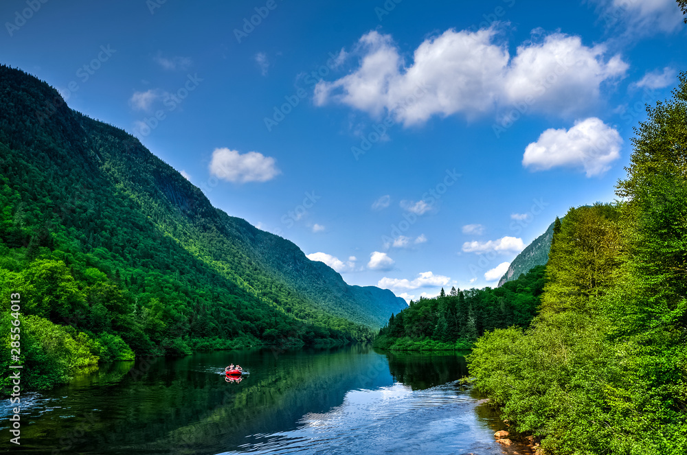 Obraz premium Rafting down the river on a warm summer day, Jacques-Cartier park, Quebec, Canada