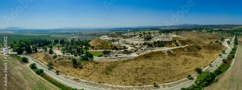 Aerial panorama of ancient city of Tel Megiddo archaeological park, site of the biblical Armageddon in Israel 