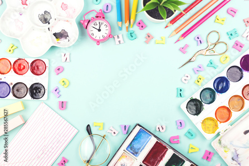 School or office supplies on a desk with copy space.