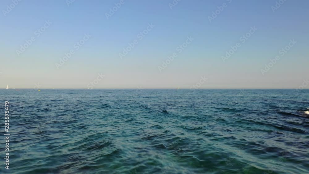 backward moving shot of ocean then beach at low altitude.
beautiful shot of the Mediterranean sea during summer, no people. backward moving shot of ocean then beach at low altitude.
beautiful shot of the Mediterranean sea during summer, no people.