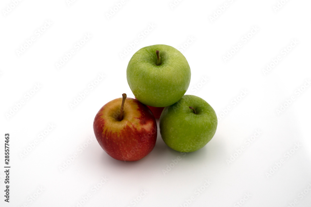 Fresh juicy group of red and green apples isolated on white background. Top view. Fresh juicy group of red and green apples isolated on white background. Top view.