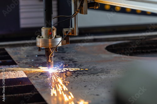 Plasma cutting metal on automatic laser machine