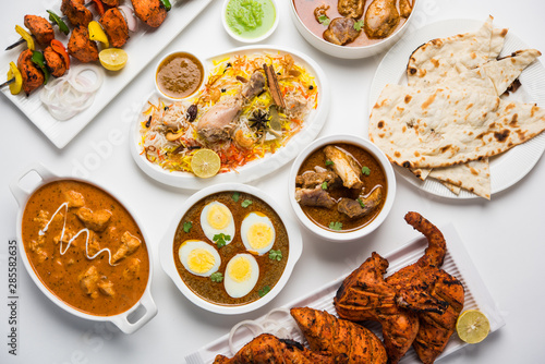 Assorted Indian Non Vegetarian food recipe served in a group. Includes Chicken Curry, Mutton Masala, Anda/egg curry, Butter chicken, biryani, tandoori murg, chicken-tikka and naan/roti