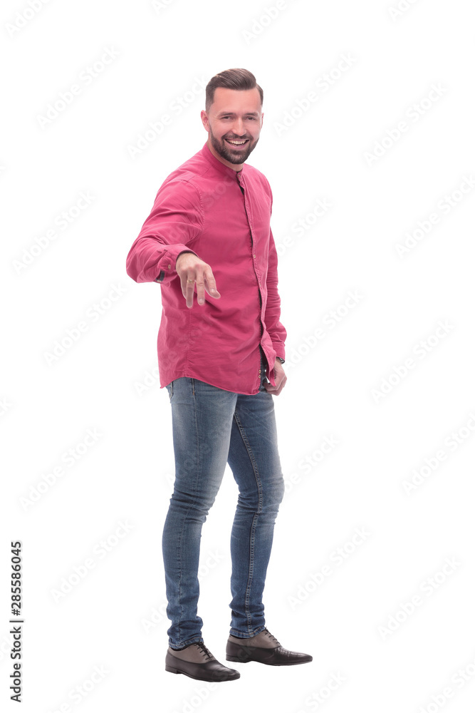 in full growth. happy young man in casual clothes in full growth. happy young man in casual clothes