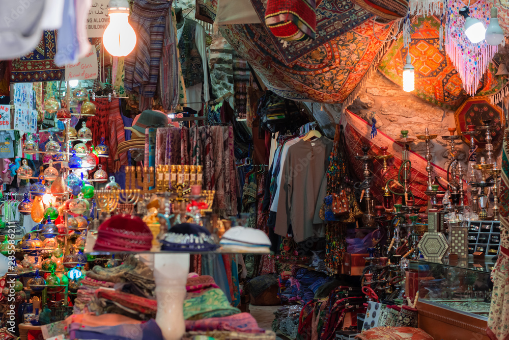 Market or Bazzar in Old City of Jerusalem.  Traditional products and souvenirs in antique shop. Israel.