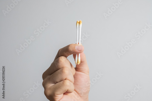 earwax on the wood spins the ears and earwax on the stick, both ears on the left side, right side
