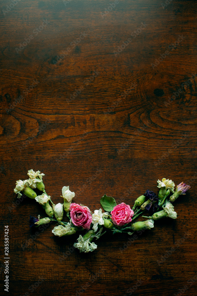 Flowers Composition on a wood table, Greeting card, Rose and carnation composition, Close up shot, Flat lay, top view, copy space. Flowers Composition on a wood table, Greeting card, Rose and carnation composition, Close up shot, Flat lay, top view, copy space.
