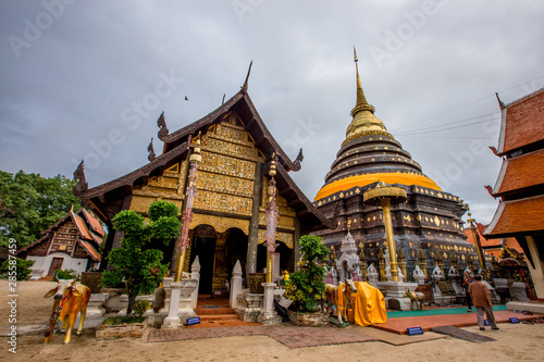 Wat Phra That Lampang Luang - Lampang: 10 August 2019, the atmosphere in the temple, tourists, family groups make merit on weekends, in the area near Lampang city, Thailand