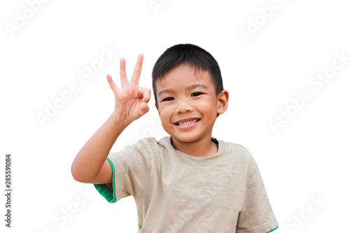 Portrait of Asian child boy showing okay gesture isolated over white background. 5 years old of kid.