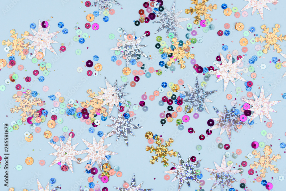 Beautiful festive background of sparkles and and sequins. Blue background with glitters. Beautiful festive background of sparkles and and sequins. Blue background with glitters.