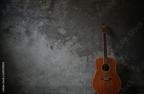 Guitar on a cement background
