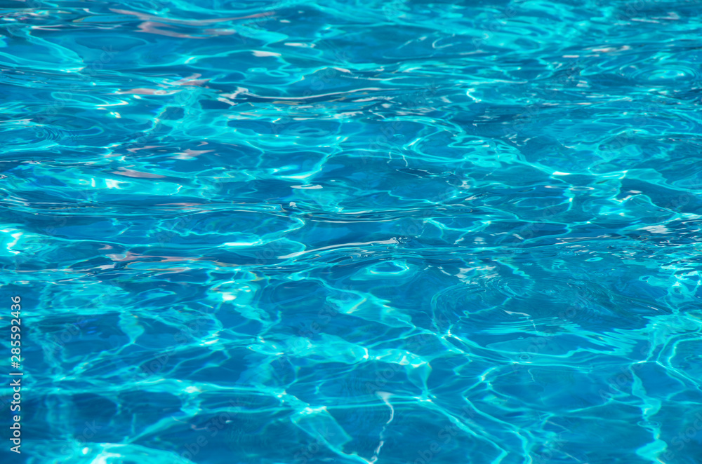 water in swimming pool rippled water detail background