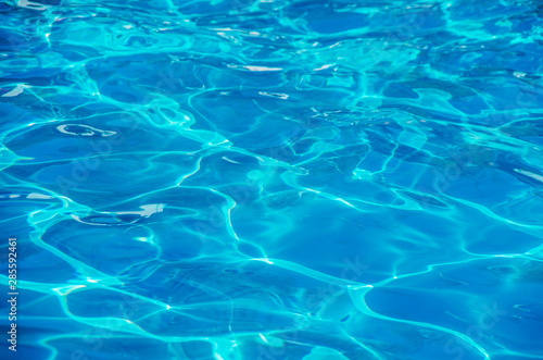 water in swimming pool rippled water detail background