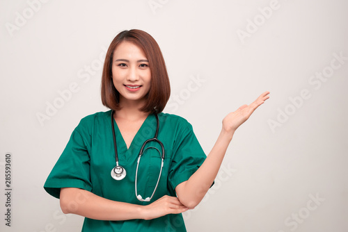 Nurse in uniform with stethoscope isolated on white background
