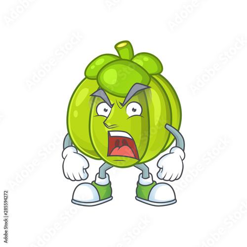 Angry green pumpkin ripe on a white background
