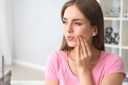Young woman suffering from ...