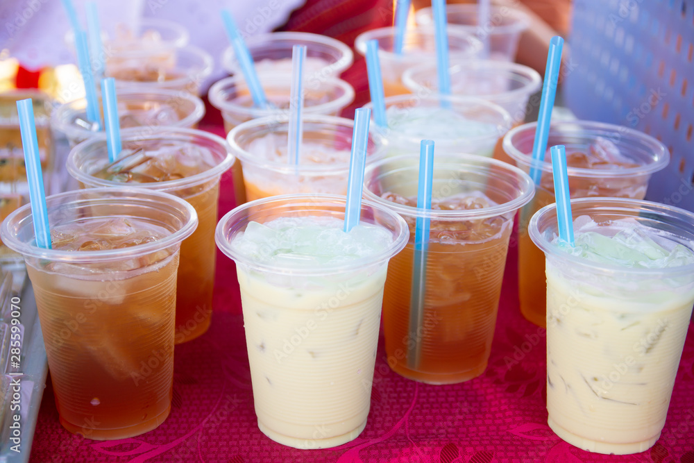 Colorful soft drink in plastic cup Colorful soft drink in plastic cup