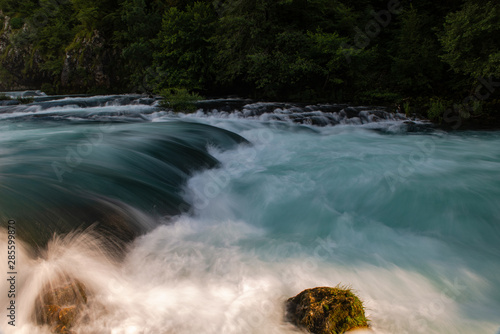 single stone in wild river